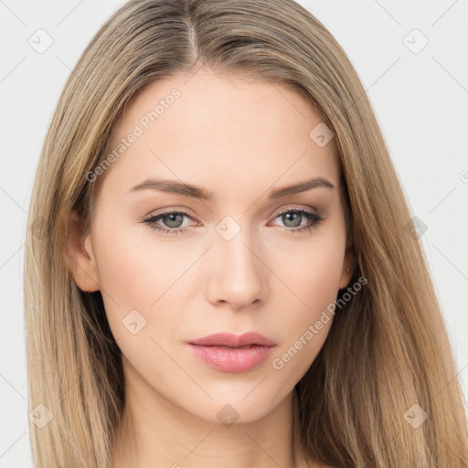 Neutral white young-adult female with long  brown hair and brown eyes