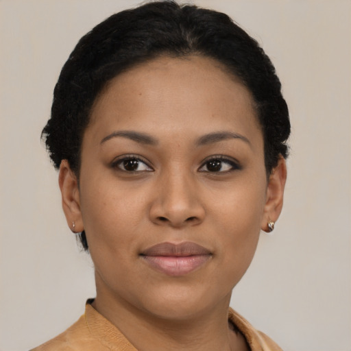 Joyful latino young-adult female with short  brown hair and brown eyes