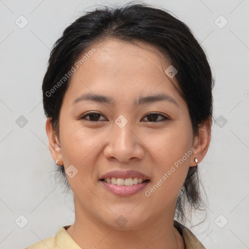 Joyful asian young-adult female with medium  brown hair and brown eyes