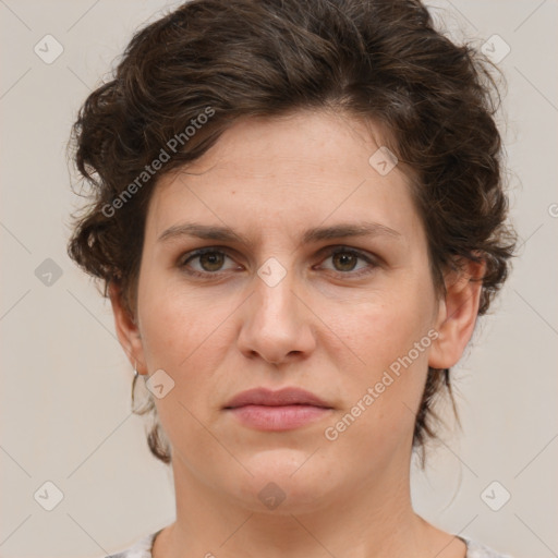 Joyful white young-adult female with medium  brown hair and green eyes