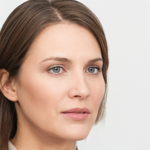 Neutral white young-adult female with long  brown hair and grey eyes