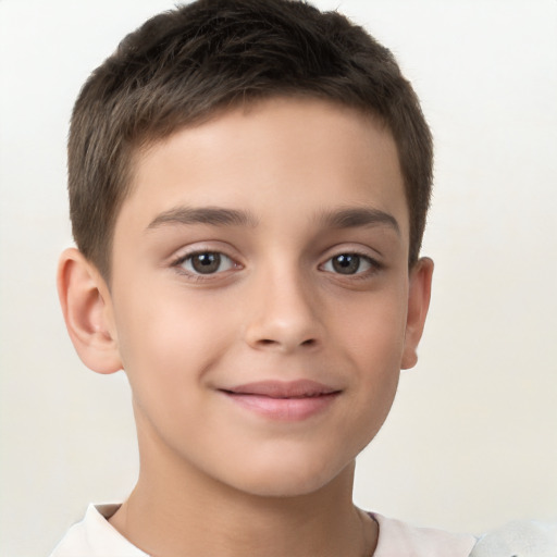 Joyful white child male with short  brown hair and brown eyes