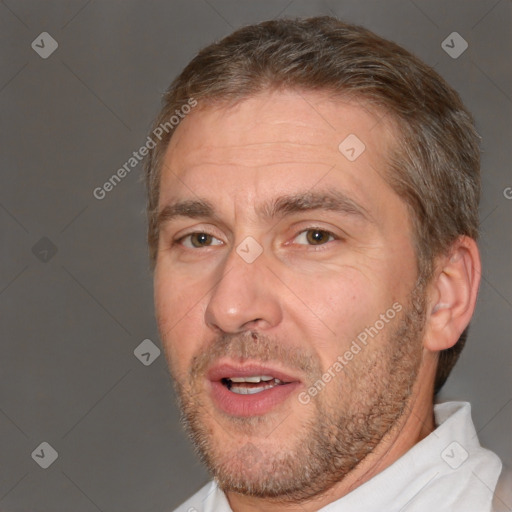 Joyful white adult male with short  brown hair and brown eyes