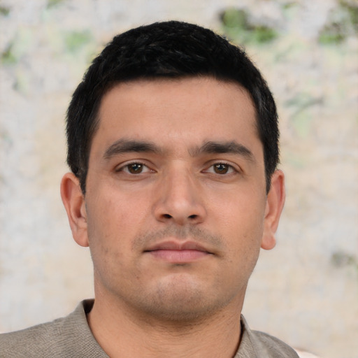 Neutral asian young-adult male with short  brown hair and brown eyes