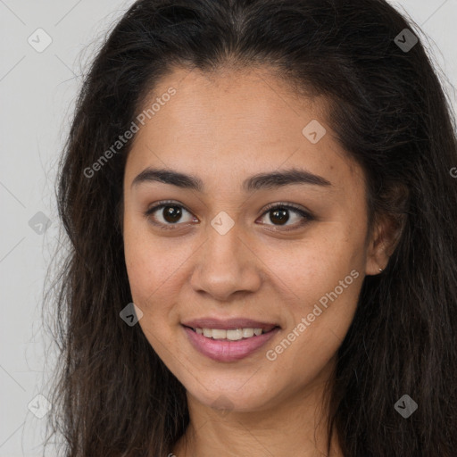 Joyful latino young-adult female with long  brown hair and brown eyes