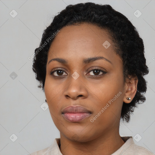 Neutral black young-adult female with short  black hair and brown eyes