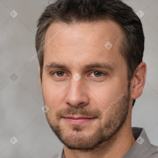 Neutral white adult male with short  brown hair and brown eyes