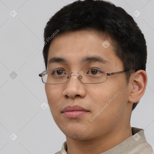 Neutral asian young-adult male with short  brown hair and brown eyes