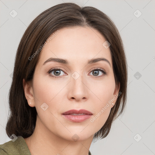 Neutral white young-adult female with medium  brown hair and grey eyes