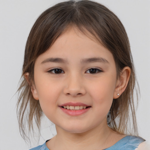 Joyful white child female with medium  brown hair and brown eyes