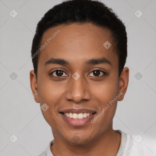 Joyful latino young-adult male with short  black hair and brown eyes