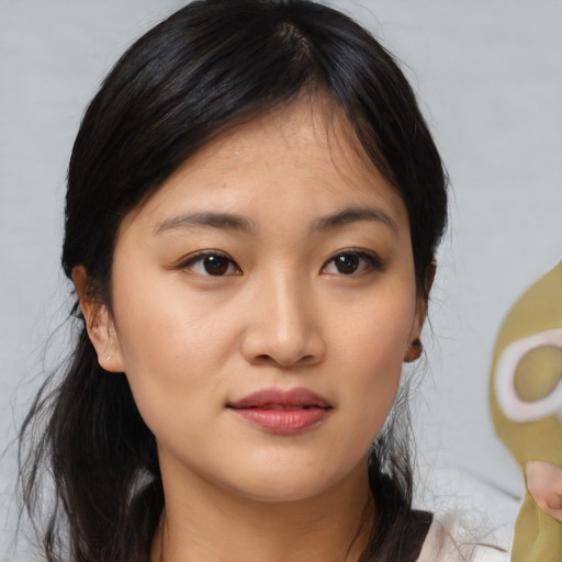 Neutral asian young-adult female with medium  brown hair and brown eyes