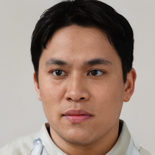 Neutral asian young-adult male with short  black hair and brown eyes