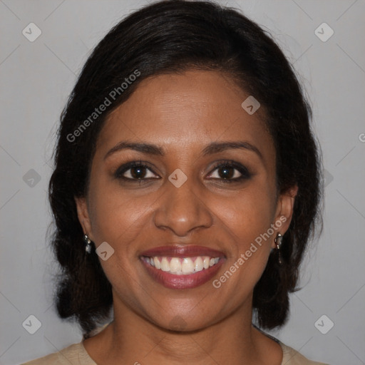 Joyful black young-adult female with medium  brown hair and brown eyes