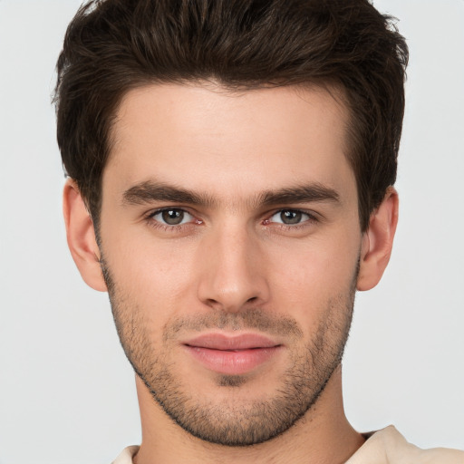 Neutral white young-adult male with short  brown hair and brown eyes