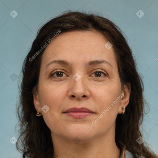 Joyful white adult female with medium  brown hair and brown eyes