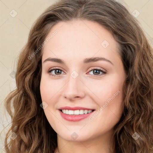 Joyful white young-adult female with long  brown hair and green eyes