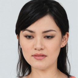 Joyful asian young-adult female with medium  black hair and brown eyes