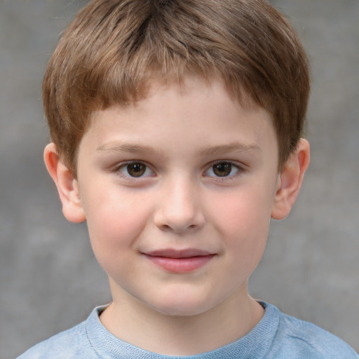 Joyful white child male with short  brown hair and grey eyes