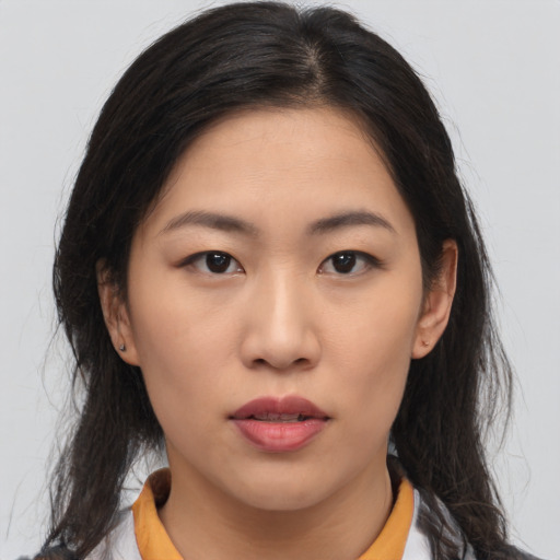 Neutral asian young-adult female with medium  brown hair and brown eyes