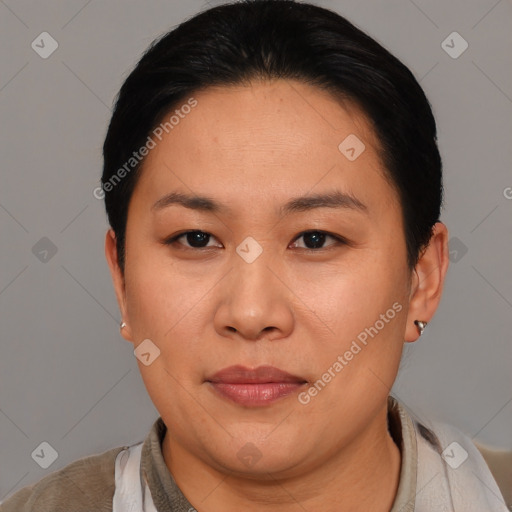 Joyful asian young-adult female with short  brown hair and brown eyes