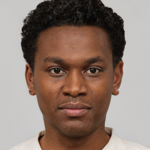 Neutral black young-adult male with short  black hair and brown eyes