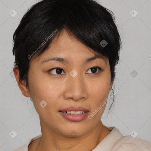 Joyful asian young-adult female with medium  brown hair and brown eyes