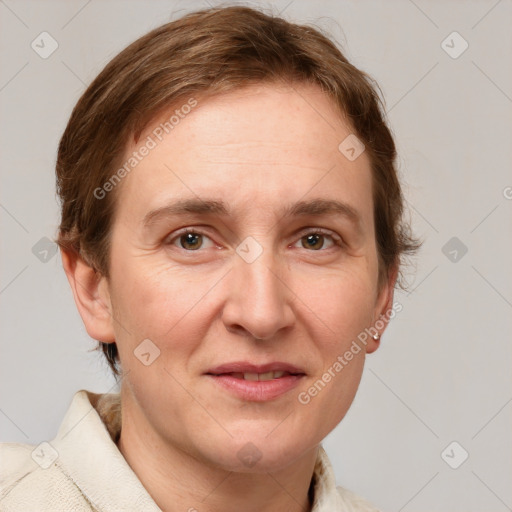 Joyful white adult female with medium  brown hair and grey eyes