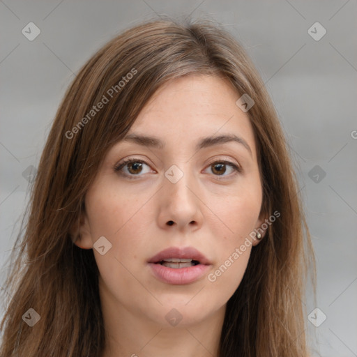 Neutral white young-adult female with long  brown hair and brown eyes