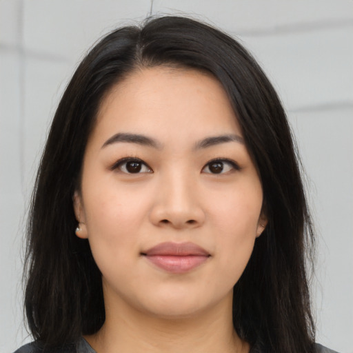 Neutral asian young-adult female with long  brown hair and brown eyes