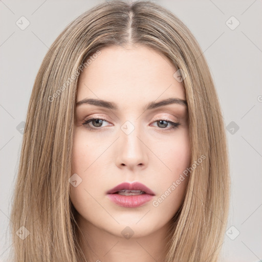 Neutral white young-adult female with long  brown hair and brown eyes