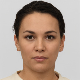 Neutral white young-adult female with short  brown hair and brown eyes