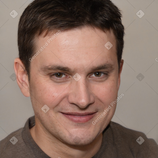 Joyful white adult male with short  brown hair and brown eyes