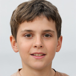 Joyful white child male with short  brown hair and brown eyes