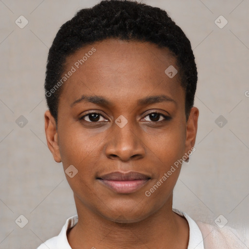 Joyful black young-adult female with short  black hair and brown eyes