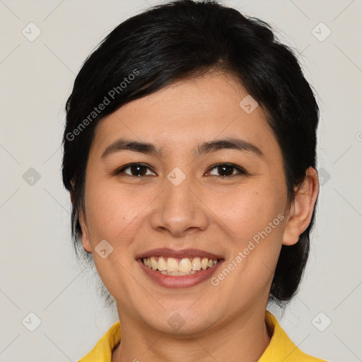 Joyful asian young-adult female with medium  brown hair and brown eyes