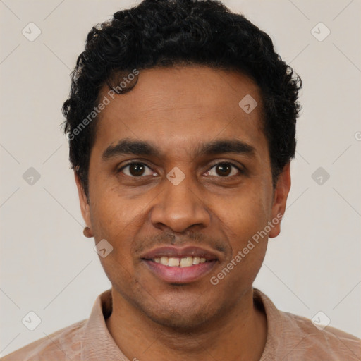 Joyful black young-adult male with short  black hair and brown eyes