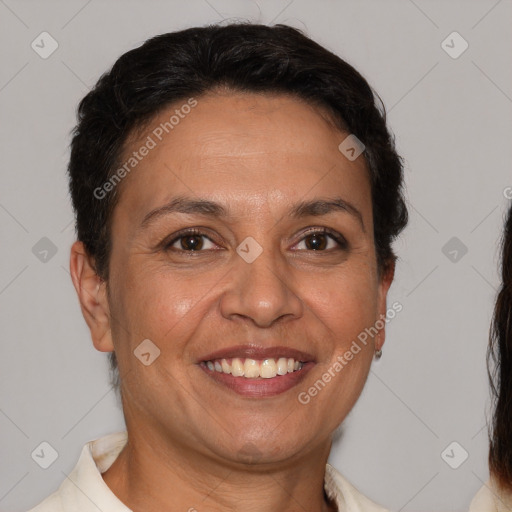 Joyful white adult female with short  brown hair and brown eyes