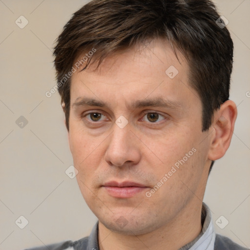 Neutral white adult male with short  brown hair and brown eyes