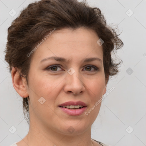 Joyful white adult female with short  brown hair and brown eyes