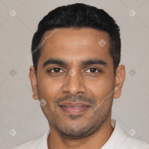 Joyful latino young-adult male with short  black hair and brown eyes