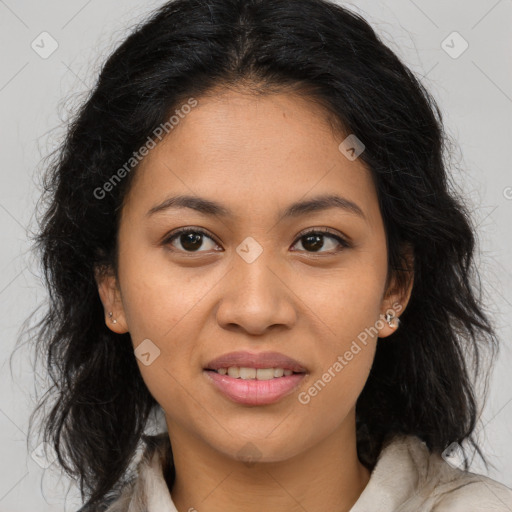 Joyful latino young-adult female with long  brown hair and brown eyes