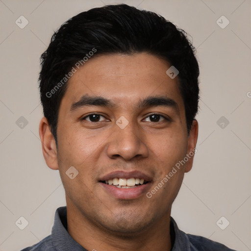 Joyful latino young-adult male with short  black hair and brown eyes