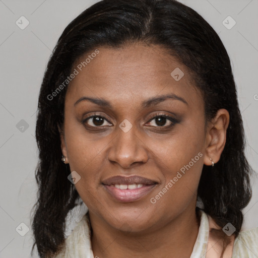 Joyful latino young-adult female with medium  brown hair and brown eyes