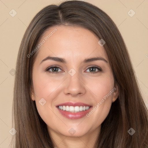 Joyful white young-adult female with long  brown hair and brown eyes