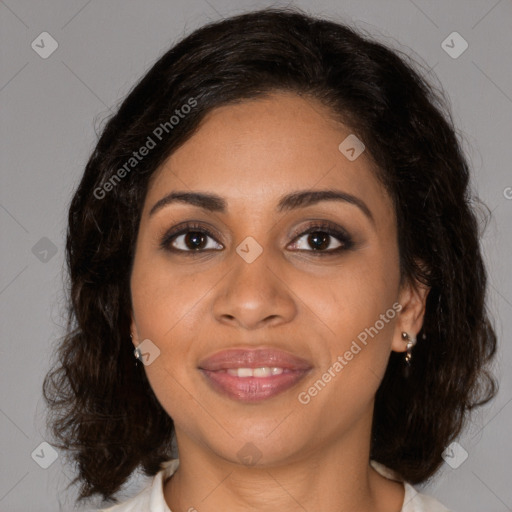 Joyful black young-adult female with medium  brown hair and brown eyes