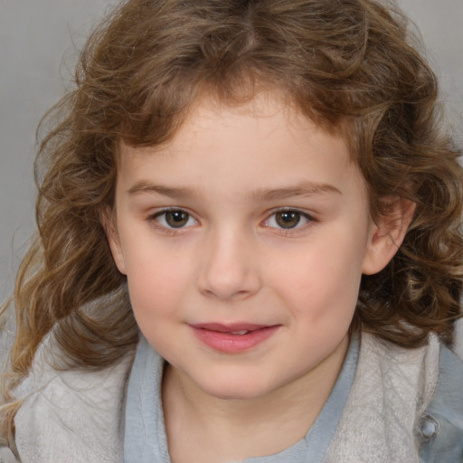 Joyful white child female with medium  brown hair and brown eyes