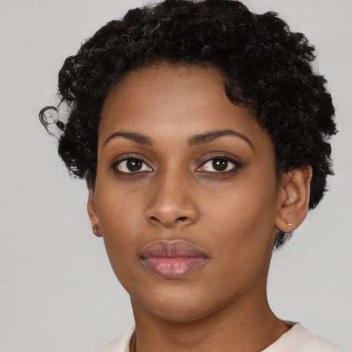 Neutral black young-adult female with short  black hair and brown eyes