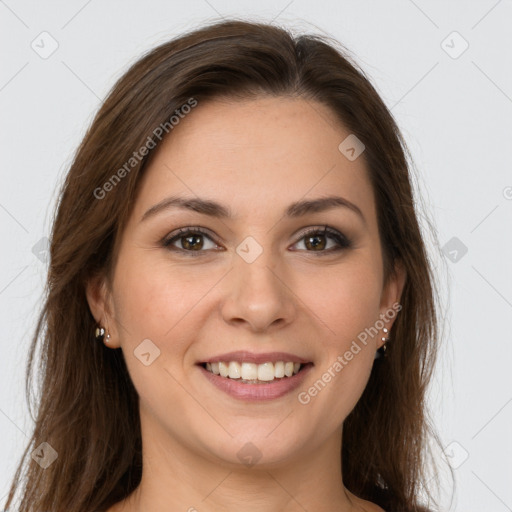 Joyful white young-adult female with long  brown hair and grey eyes