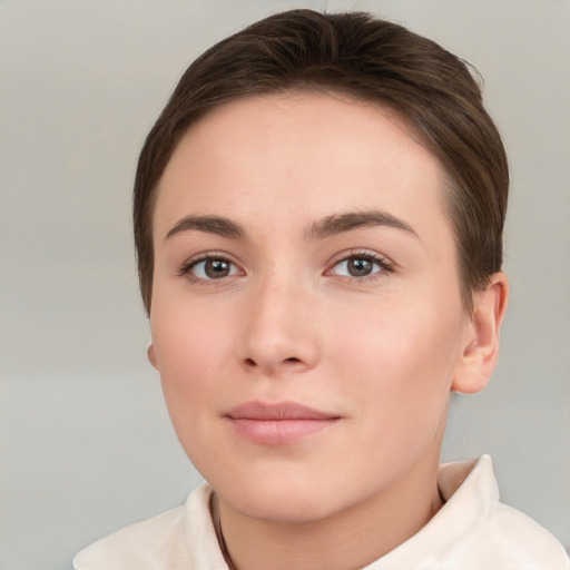 Neutral white young-adult female with short  brown hair and brown eyes